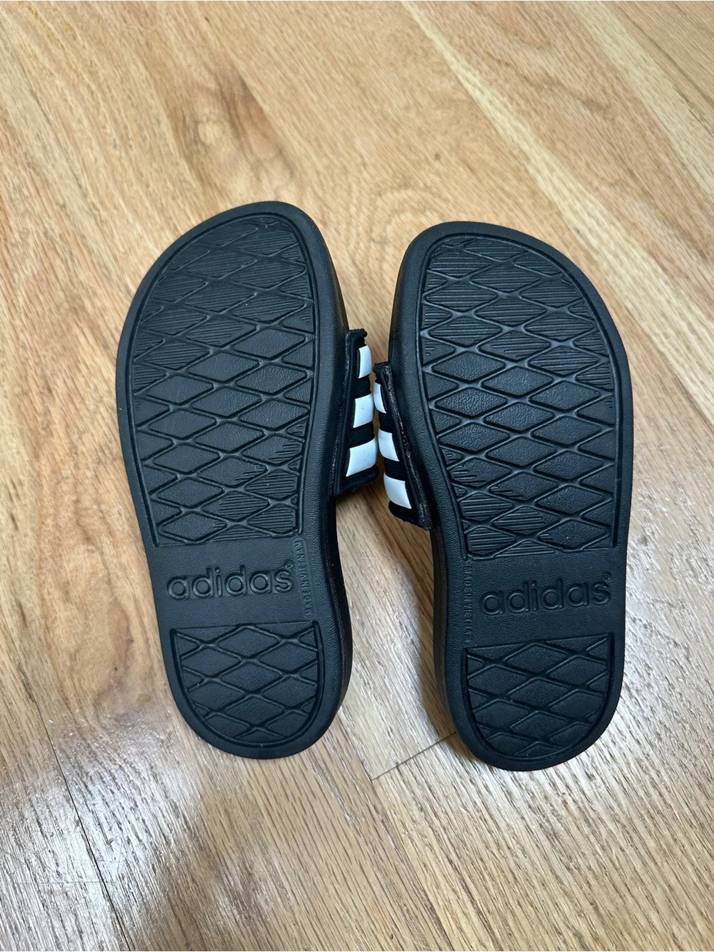 adidas Kids Black and White Slide Sandals with Three Stripes